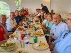 Church leader with first responders at St Demetrios Greek Fest in Elmhurst