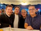 Participants and church leader enjoying the St Demetrios Greek Fest in Elmhurst