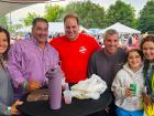 Church staff with guests at St Nectarios Greek Fest in Palatine