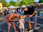 Family enjoying the St. Nectarios Greek Fest in Palatine