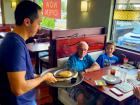 Serving the famous Saganaki at Maple Butter Cafe in Plainfield