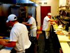Hard working kitchen crew at Tasty Waffle Restaurant in Romeoville