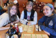 Friends enjoying breakfast at Butterfield's Pancake House & Restaurant in Northbrook