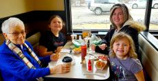 Family enjoying lunch at Franksville Restaurant in Chicago