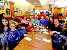 Family enjoying lunch at Georgie V's Pancakes & More in Northbrook