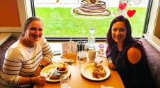 Friends enjoying breakfast at Golden Brunch Restaurant in Arlington Heights