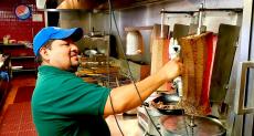 Slicing the famous Gyros at Goodi's Restaurant in Niles