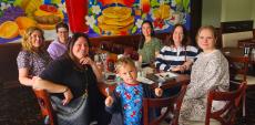 Friends enjoying breakfast at Maple Butter Cafe in Plainfield