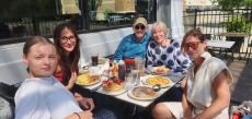 Family enjoying breakfast at Maple Butter Cafe in Plainfield