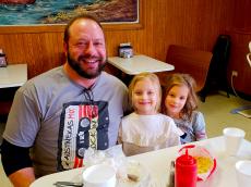 Family enjoying lunch at Nick's Drive-In Chicago