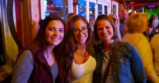 Friends enjoying dinner at Niko's Red Mill Tavern in Woodstock