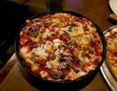 The famous pan pizza at North Branch Pizza & Burger Company in Glenview