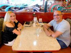 Couple enjoying lunch at Omega Restaurant & Pancake House in Downers Grove