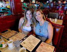 Mom & daughter enjoying breakfast at Omega Restaurant & Pancake House in Downers Grove