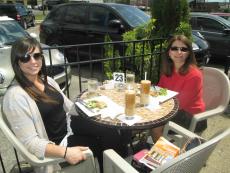 Friends enjoying the patio at Papagalino Cafe Bakery in Niles