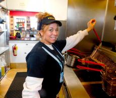 Friendly kitchen staff at Photo's Hot Dogs in Palatine