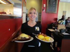 Hearty skillet and benedict served at Stacked Pancake House in Oak Lawn