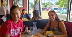Friends enjoying lunch at Teddy's Diner in Elk Grove Village