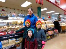 Family shopping for groceries at Village Market Place in Skokie