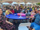 Family enjoying the Big Greek Food Fest of Niles
