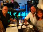 Happy customers enjoying dinner at Brusko Authentic Greek Cuisine - Schaumburg
