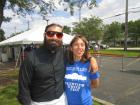 Church leader with volunteer -  Glenview Greek Fest at Sts. Peter & Paul