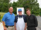 Church leader with volunteers -  Glenview Greek Fest at Sts. Peter & Paul