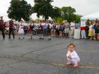 Young fan enjoying the dance performance -  Glenview Greek Fest at Sts. Peter & Paul