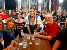 Friends with server enjoying Johnny's Kitchen & Tap Octoberfest in Glenview