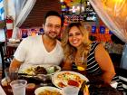 Couple enjoying Johnny's Kitchen & Tap Octoberfest in Glenview