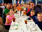 Family enjoying Johnny's Kitchen & Tap Octoberfest in Glenview