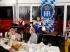 Friends enjoying Johnny's Kitchen & Tap Octoberfest in Glenview