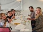 Family enjoying the St. Demetrios Elmhurst Greek Fest