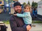 Father and daughter enjoying the St. Demetrios Elmhurst Greek Fest