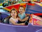 Enjoying the kid's rides at the St Demetrios Greek Fest in Elmhurst