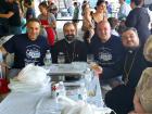 Church leaders with guests at the St Demetrios Greek Fest in Elmhurst