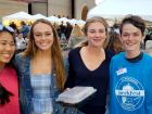 Happy participants with volunteer - St. Nectarios Greekfest, Palatine