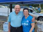 Volunteer with family at the St. Nectarios Greek Fest in Palatine