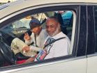 Happy drive-thru customers at the St. Nectarios Greek Fest in Palatine