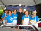 Church leader with volunteers -  St. Nectarios Greekfest, Palatine 