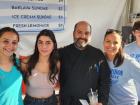 Church leader with volunteers at the St. Spyridon Greek Fest - Palos Heights