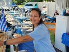 Happy volunteer at the St. Spyridon Greek Fest - Palos Heights