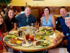 Family enjoying outdoor lunch at Annie's Pancake House in Skokie