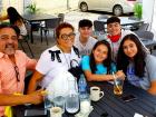 Family enjoying outdoor lunch at Annie's Pancake House in Skokie