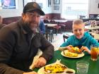 Father and son enjoying breakfast at The Canteen Restaurant in Barrington