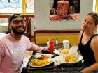 Couple enjoying lunch at Charcoal Flame Grill in Morton Grove