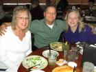 Family enjoying dinner at Jameson's Charhouse in Arlington Heights