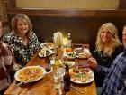 Friends enjoying dinner at Ellwood Steak and Fish House in DeKalb