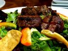 The famous steak salad at Ellwood Steak and Fish House in DeKalb