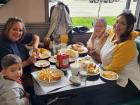 Family enjoying lunch at Les Brothers Restaurant in Oak Lawn